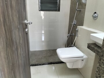 Bathroom in 2 BHK Apartment at Harasiddh Viraaj, Malad East – for Rent