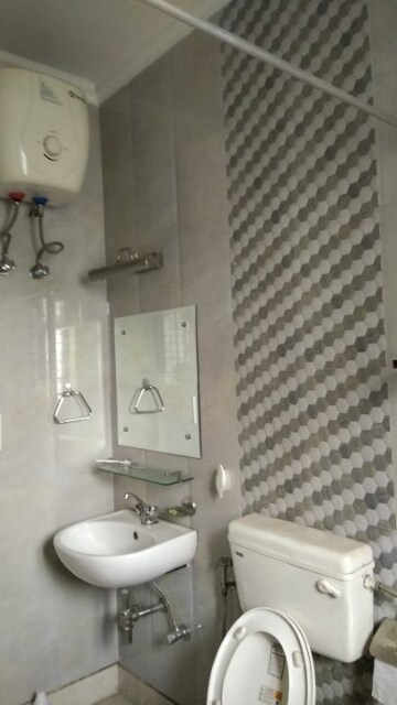 Bathroom in 3.5 BHK Builder Floor at RWA Residential Society, Sector 40 – for Rent