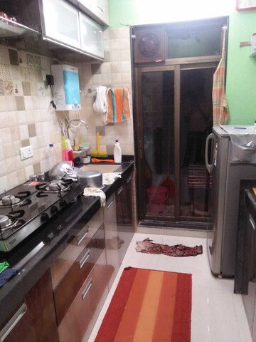Kitchen in 1 BHK Apartment at Siddhivinayak Tower, Vartak Nagar – for Sale