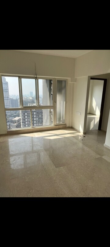 Living Room in 1 BHK Apartment at Omkar Signet, Malad East – for Rent