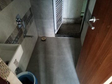 Bathroom in 1.5 BHK Apartment at Aastha River View, Taloja – for Rent