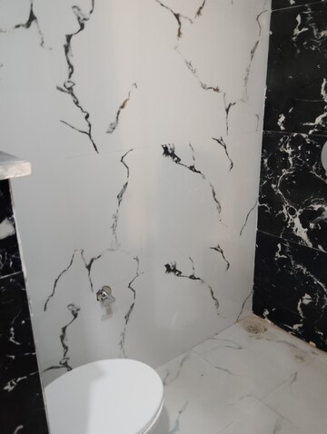 Bathroom in 3 BHK Builder Floor at Sunny Enclave – for Sale