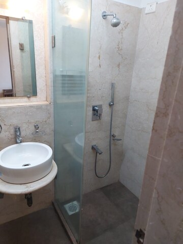 Bathroom in 1 BHK Apartment at Kanakia Rainforest, Andheri East – for Rent