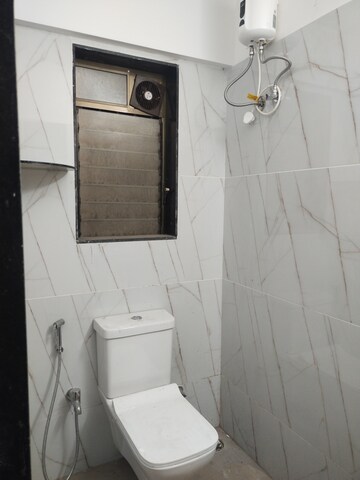 Bathroom in 2 BHK Apartment at MICL Aaradhya Nine, Ghatkopar East – for Rent