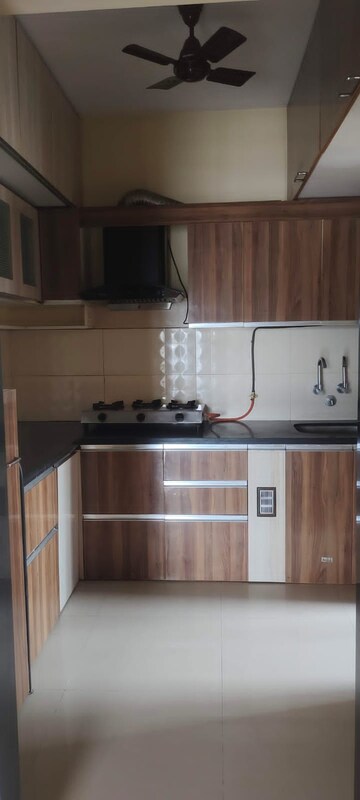 Kitchen in 2 BHK Apartment at Shanti Gardens , Mira Road – for Sale