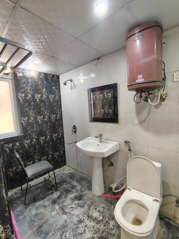 Bathroom in 2 BHK Apartment at Migsun Twinz, Eta Ii Greater Noida – for Rent