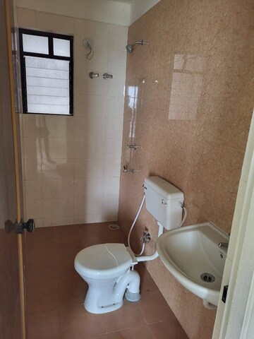 Bathroom in 2 BHK Apartment at Arya Aquaville, New Town Action Area 1 – for Sale