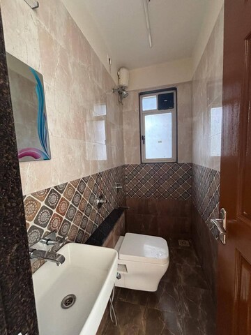 Bedroom in 1 BHK Apartment at Sunteck Maxxworld, Naigaon East – for Rent