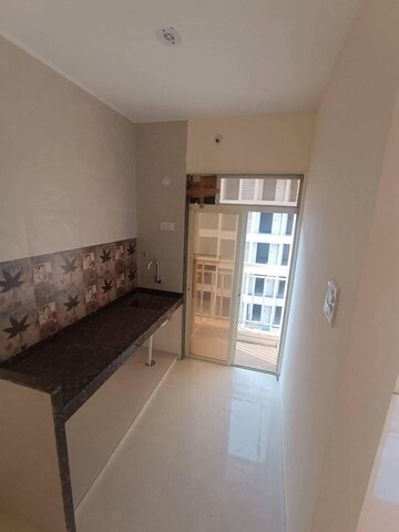 Kitchen in 1 BHK Apartment at Sunteck West World, Naigaon East – for Rent
