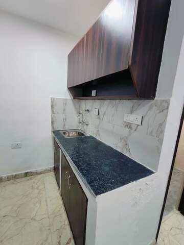 Kitchen in 1 RK Builder Floor at Ansal Sushant Lok I, Sector 43 – for Rent
