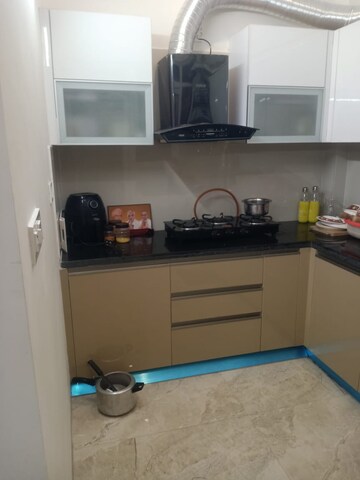 Kitchen in 3 BHK Apartment at Artique Uptown Skylla, International Airport Road – for Rent