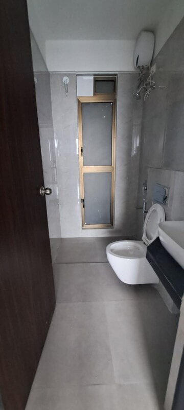 Bathroom in 2 BHK Apartment at Raymond Ten X Habitat, Pokhran Road No 2 – for Rent