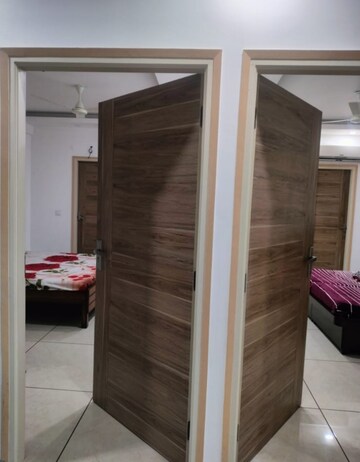 Building Lobby in 3 BHK Apartment at Guru Nanak Enclave, Dhakoli Village – for Rent
