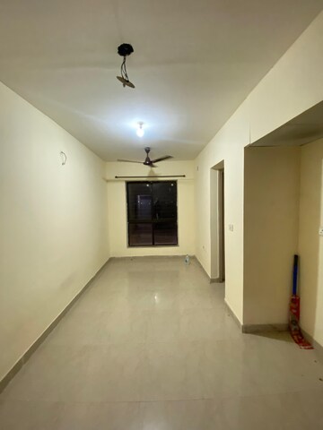 Living Room in 1 BHK Apartment at Lodha Crown Quality Homes Dombivli, Dombivli East – for Rent