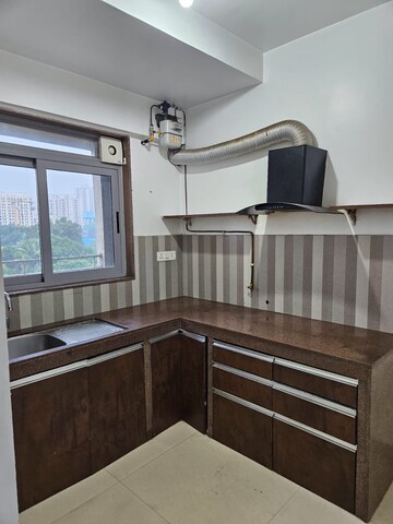 Kitchen in 2 BHK Apartment at Kalpataru Parkcity Sunrise B, Kolshet Road – for Sale
