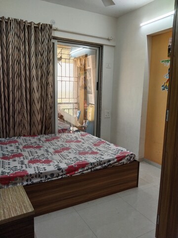 Bedroom in 2 BHK Apartment at Adharwadi – for Sale