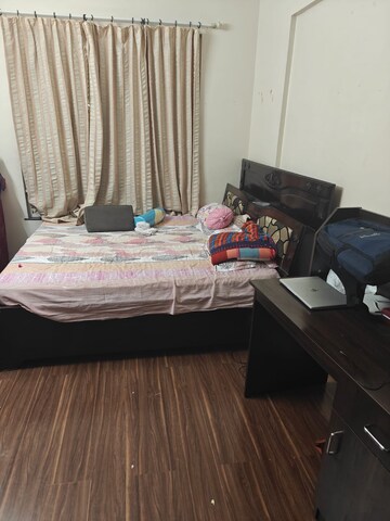 Bedroom in 2 BHK Apartment at Ganga Arcadia, Kharadi – for Rent