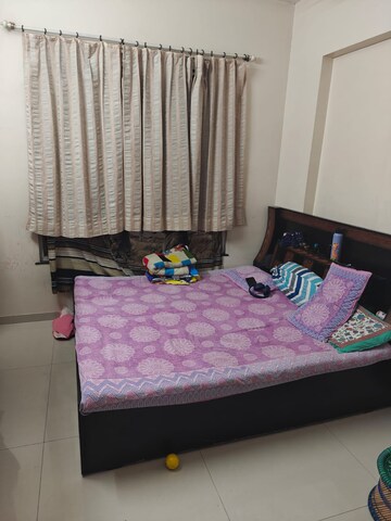 Bedroom in 2 BHK Apartment at Ganga Arcadia, Kharadi – for Rent