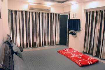 Bedroom in 2 BHK Apartment at Lok Nirman Apartments, Khar West – for Sale