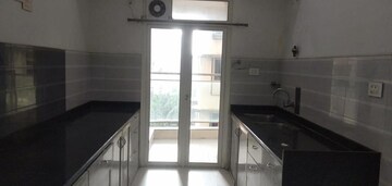 Kitchen in 2 BHK Apartment at Lokhandwala Harmony, Worli – for Rent