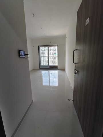 Building Lobby in 1 BHK Apartment at Ashar Axis, Majiwada – for Rent