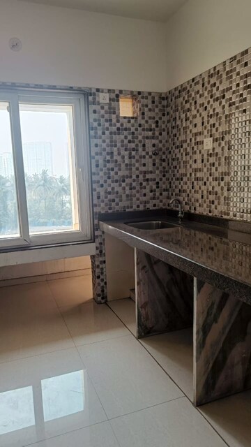 Kitchen in 1 BHK Apartment at Arihant Aspire, Palaspe Phata – for Sale