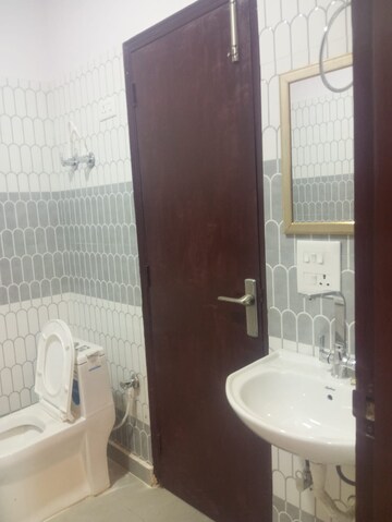Bathroom in 3 BHK Apartment at Jaipurias Sunrise Greens, Ahinsa Khand 1 – for Rent