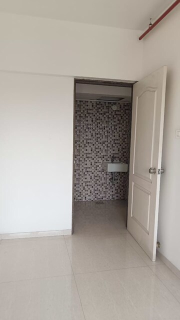 Room in 2 BHK Apartment at Arihant Aspire, Palaspe Phata – for Sale