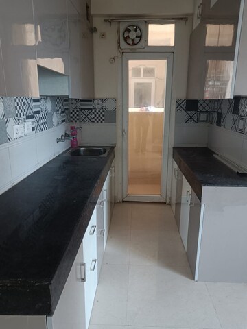 Kitchen in 2 BHK Apartment at Signature The Serenas, Sohna Sector 36 – for Sale