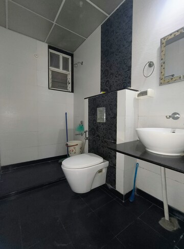 Bathroom in 2 BHK Apartment at Ganga Arcadia, Kharadi – for Rent