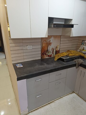 Kitchen in 3 BHK Builder Floor at Mahavir Enclave 1 – for Sale