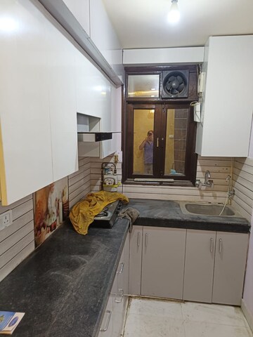 Kitchen in 3 BHK Builder Floor at Mahavir Enclave 1 – for Sale