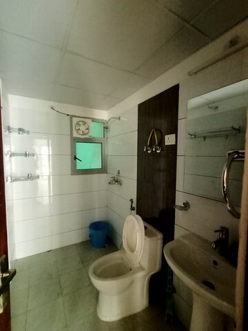 Bathroom in 3 BHK Apartment at Gulshan Bellina, Sector 16 Greater Noida – for Rent