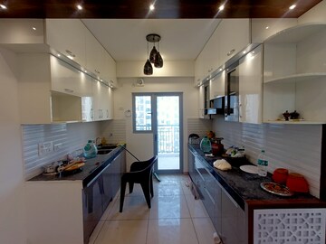 Kitchen in 3 BHK Apartment at Gulshan Bellina, Sector 16 Greater Noida – for Rent