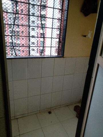 Bathroom in 2 BHK Apartment at Bhoomi Park II, Malad West – for Sale
