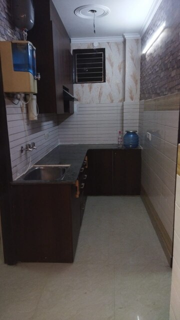 Kitchen in 3 BHK Builder Floor at Mahavir Enclave 1 – for Sale