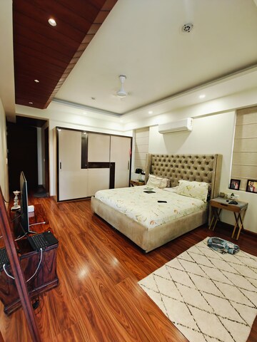Bedroom in 3 BHK Builder Floor at Ansal Sushant Lok I, Sector 43 – for Rent