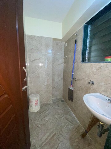 Bathroom in 1 BHK Apartment at Lodha Palava Crown, Dombivli East – for Rent