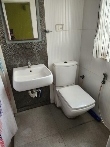 Bathroom in 2 BHK Apartment at Sheffield Towers, Andheri West – for Rent
