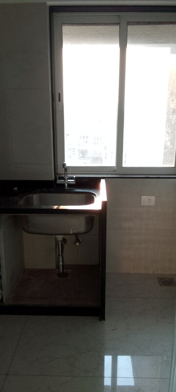 Kitchen in 2 BHK Apartment at Skyline Sky Imperia, Vile Parle East – for Rent