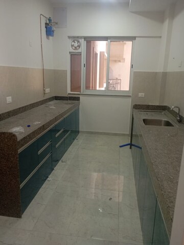 Kitchen in 3 BHK Apartment at Gera Planet Of Joy, Kharadi – for Sale
