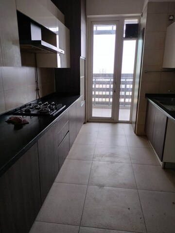 Kitchen in 3 BHK Apartment at Mahindra Luminare, Sector 59 – for Rent