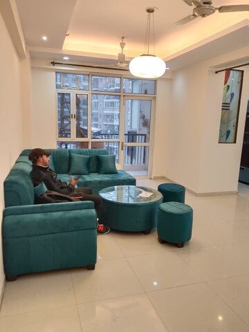 Living Room in 2 BHK Apartment at Aims Golf City, Sector 75 – for Rent