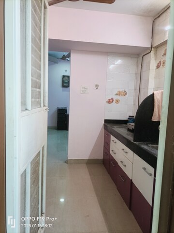 Kitchen in 2 BHK Apartment at Karve Nagar – for Sale