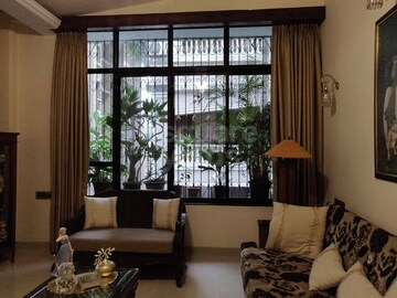 Living Room in 4 BHK Apartment at The Souvenir CHS, Bandra West – for Sale