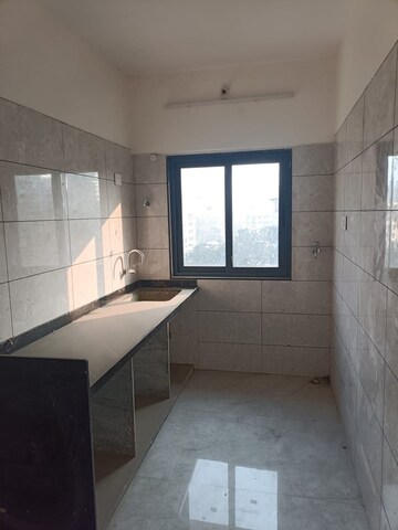 Kitchen in 2 BHK Apartment at Man Shilpa Terraces, Bandra West – for Rent