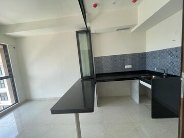 Kitchen in 2 BHK Apartment at Lodha Quality Home Tower 2, Majiwada – for Rent
