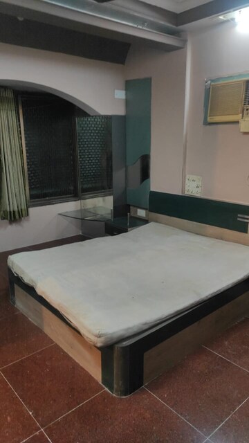Bedroom in 2 BHK Apartment at Gokuldham Complex, Goregaon East – for Rent