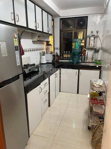 Kitchen in 2 BHK Apartment at Uttam Niwas, Bandra West – for Sale