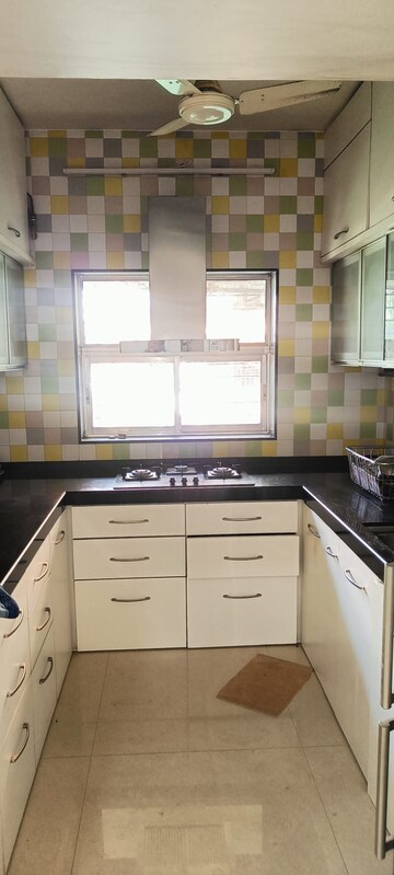 Kitchen in 2 BHK Apartment at Harmony CHS Goregaon, Goregaon East – for Rent